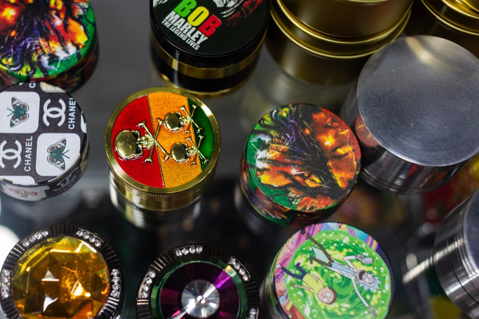 Decorative herb grinders and accessories closeup