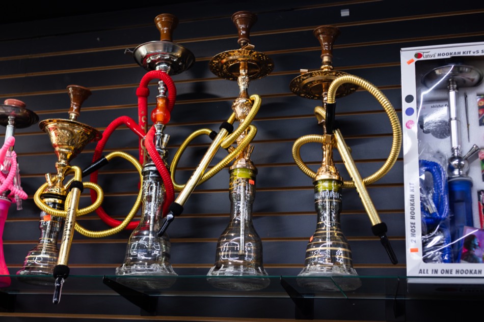 Hookah display with assembled hookahs on glass shelf