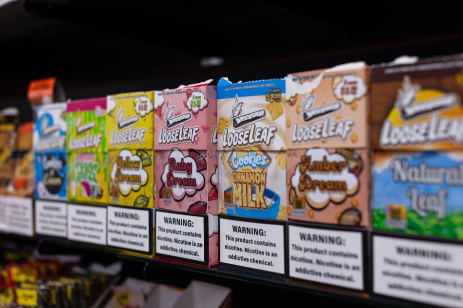 LooseLeaf wrap shelf with colorful flavor boxes